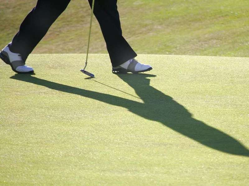 Tiger woods walking the golf course