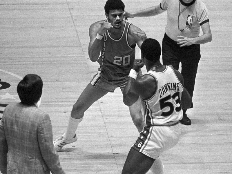 Maurice Lucas and Darrell Dawkins square up to fight