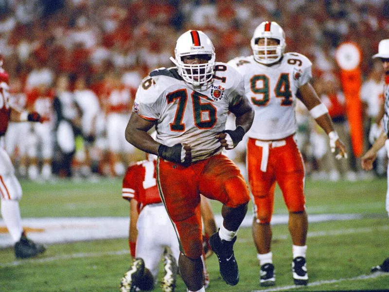 Miami defensive linemen Warren Sapp and Dwayne Johnson