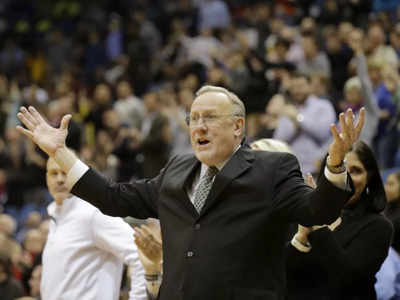 Minnesota Timberwolves head coach Rick Adelman questions a call during overtime