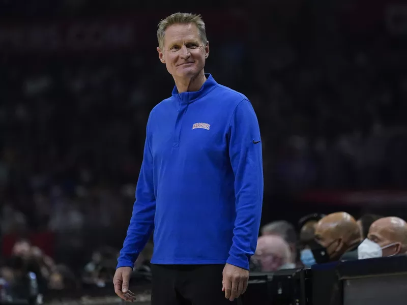 Steve Kerr stands on sidelines