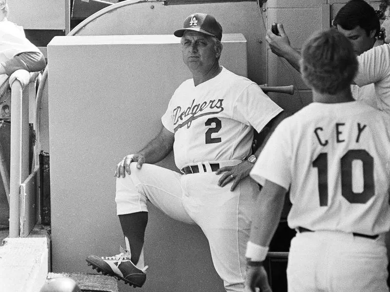 Tommy Lasorda standing in dugout