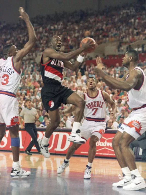 Terry Porter flies through the air