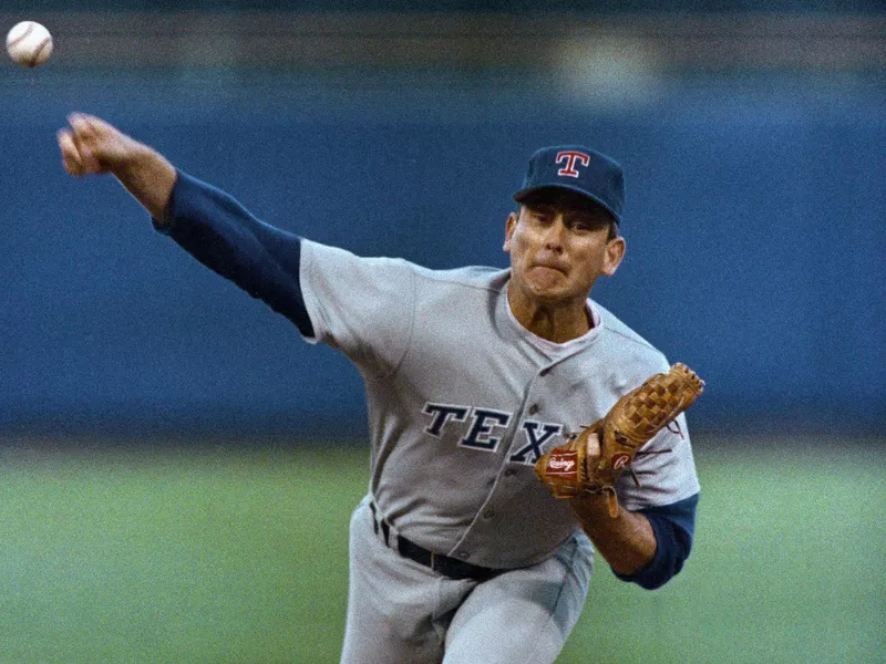 Texas Rangers pitcher Nolan Ryan fires one home