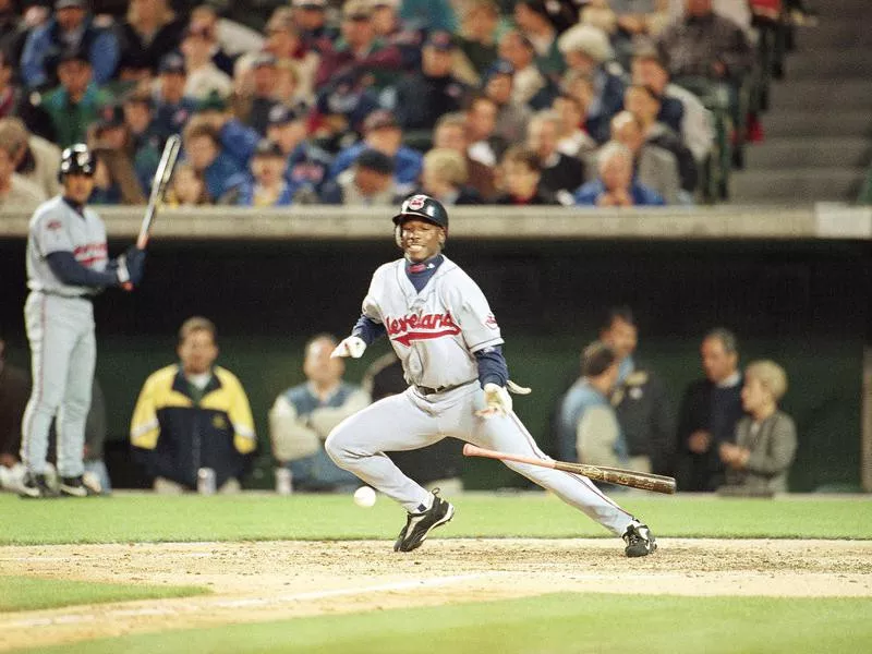 Kenny Lofton tries to lay down bunt