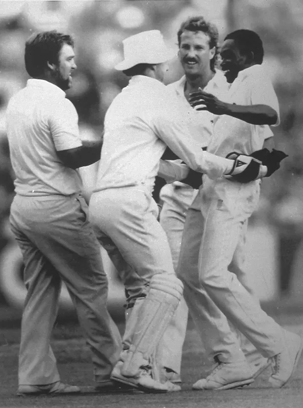 Ian Botham celebrates