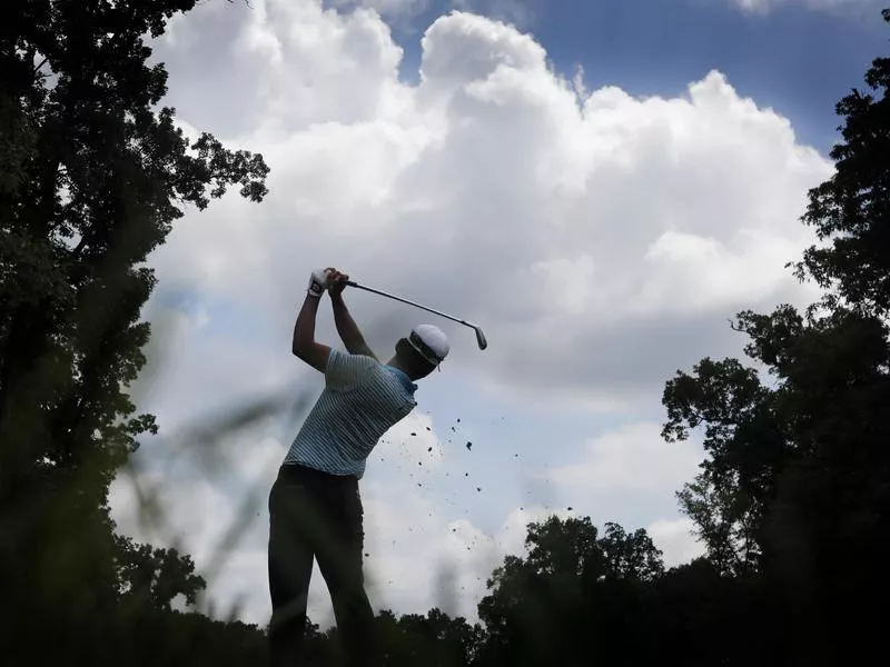 Michael Kim tees off the TPC Deere Run in Silvis, Illinois