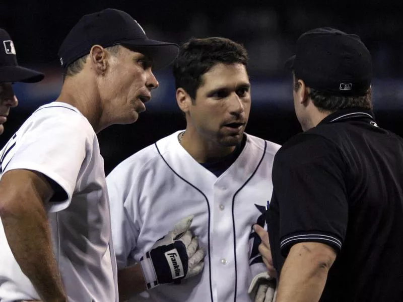 Alan Trammell, Bobby Higginson, umpire Matt Hollowell