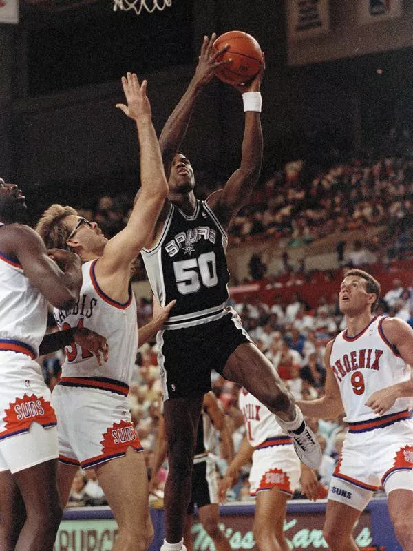 David Robinson drives to the basket