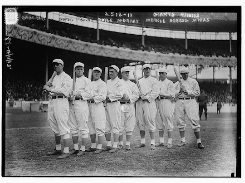 George Burns with New York Giants teammates posing with bats