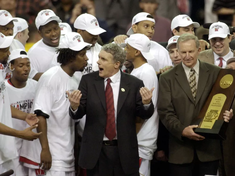 Maryland head coach Gary Williams celebrates with players