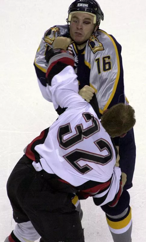 Rob Ray fighting with Nashville Predators defenseman Marc Moro