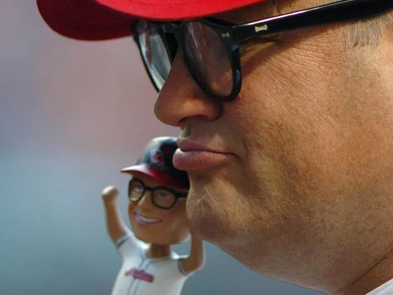 Drew Carey and bobblehead doll