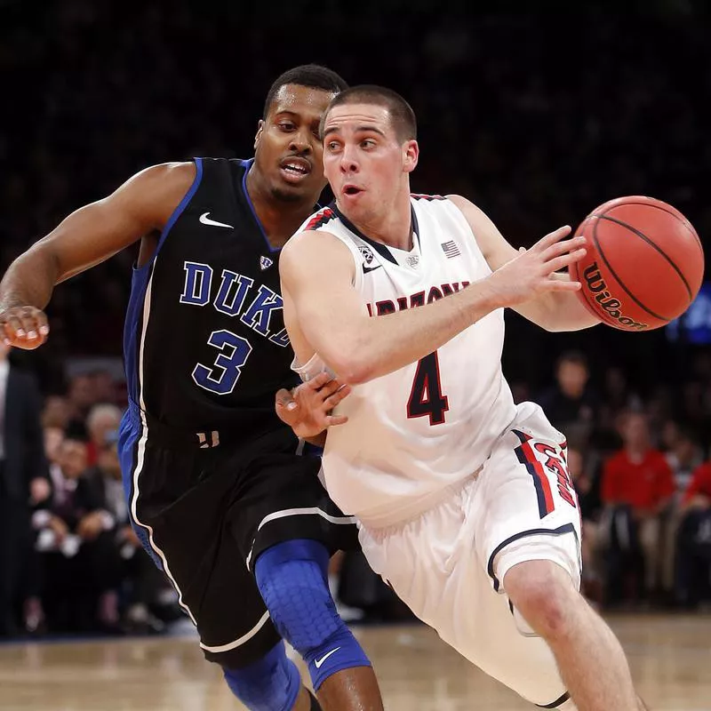 T.J. McConnell drives against Duke's Tyler Thornton