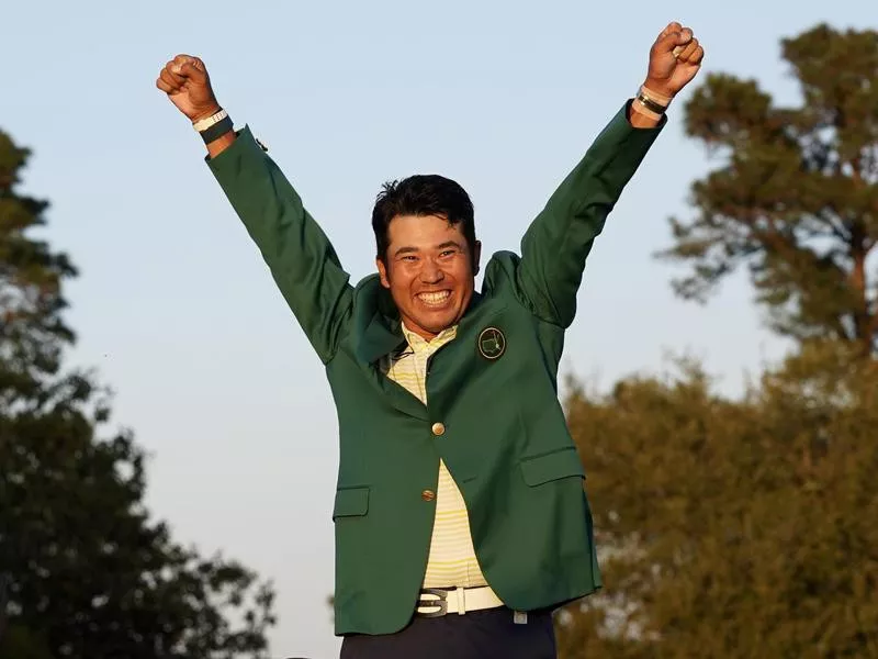 Hideki Matsuyama celebrates