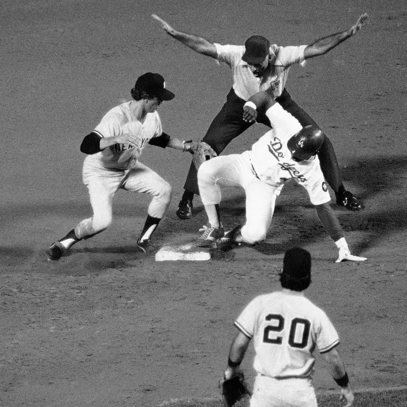 Bill North slides safely into second base for the Dodgers