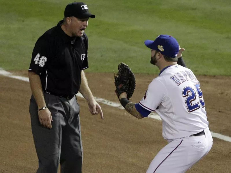 Ron Kulpa and Mike Napoli