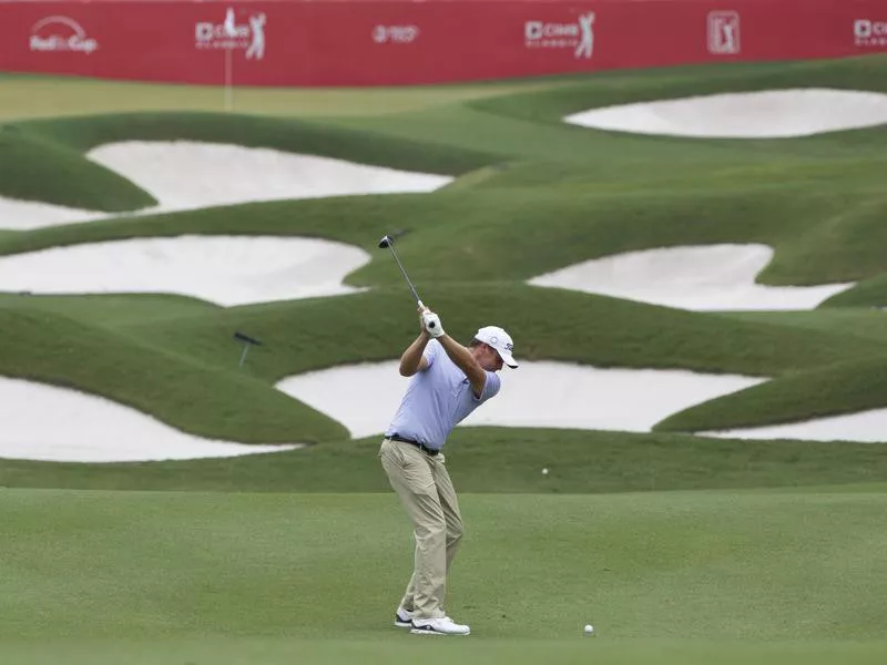 Nick Watney follows his shot in CIMB Classic