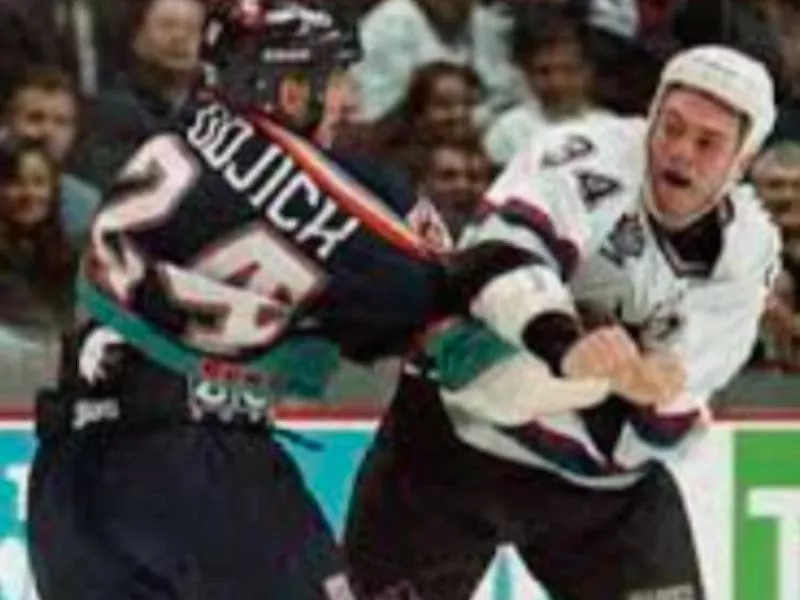 Gino Odjick in a fight