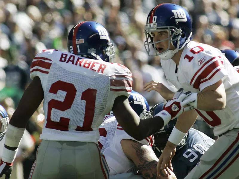 Tiki Barber and Eli Manning