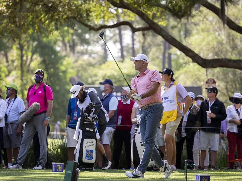 Stewart Cink watches drive off 11th tee