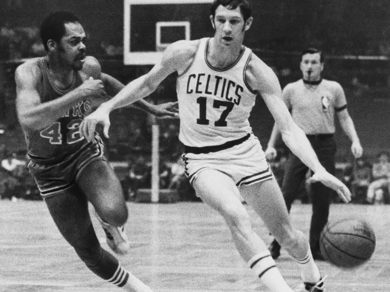 John Havlicek protects ball