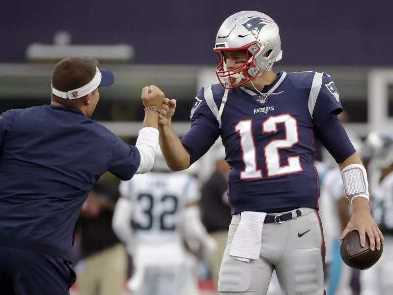 Josh McDaniels and Tom Brady