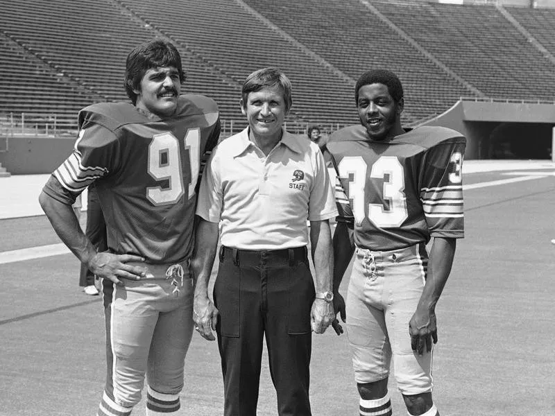 Johnny Majors with Tony Dorsett and Al Romano