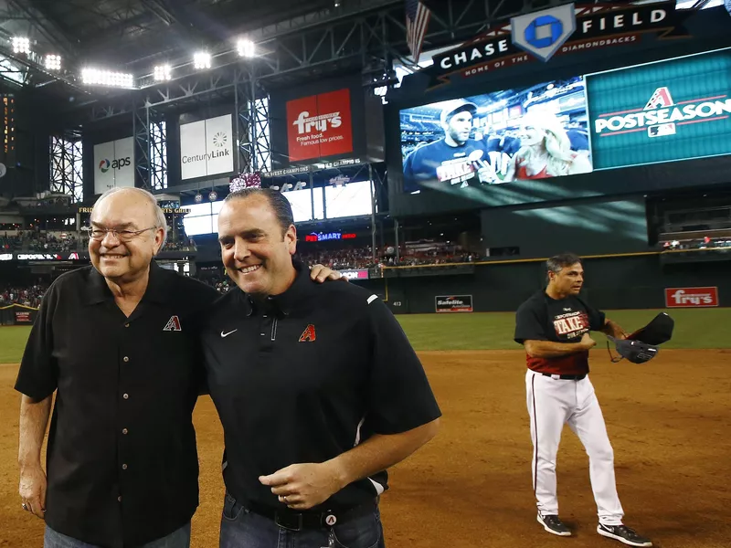 Arizona Diamondbacks owner Ken Kendrick and team president and CEO Derrick Hall smile