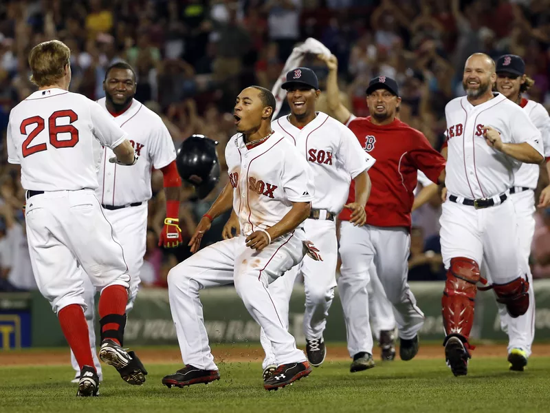 Mookie Betts celebrating with team