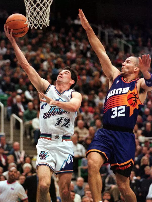 John Stockton puts in a layup