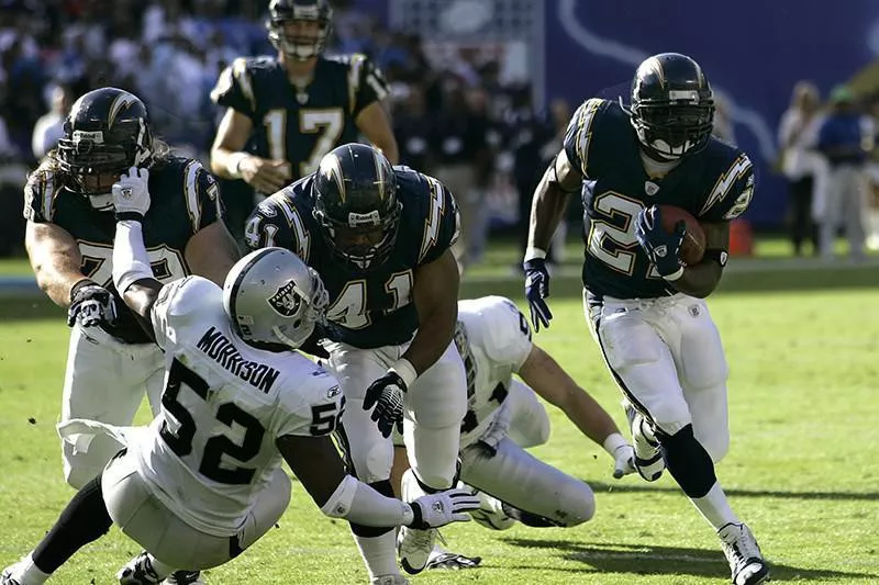 LaDainian Tomlinson and Lorenzo Neal