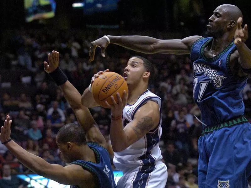 Kevin Garnett and Marcus Williams