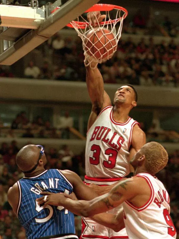 Scottie Pippen dunks the ball against the Orlando Magic