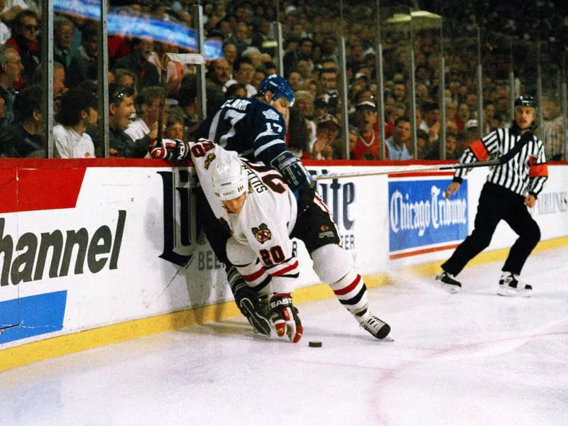 Toronto Maple Leaf Wendel Clark battles with Chicago Blackhawk Gary Suter