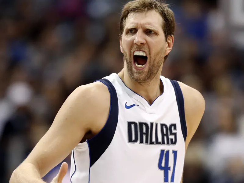 Dirk Nowitzki celebrates a basket