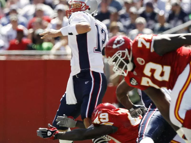 Tom Brady and Bernard Pollard