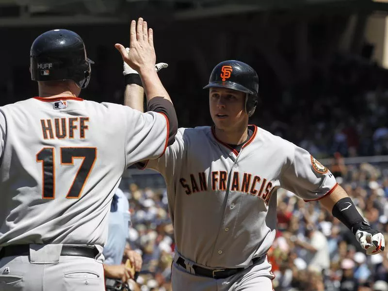 San Francisco Giants' Buster Posey celebrates homer