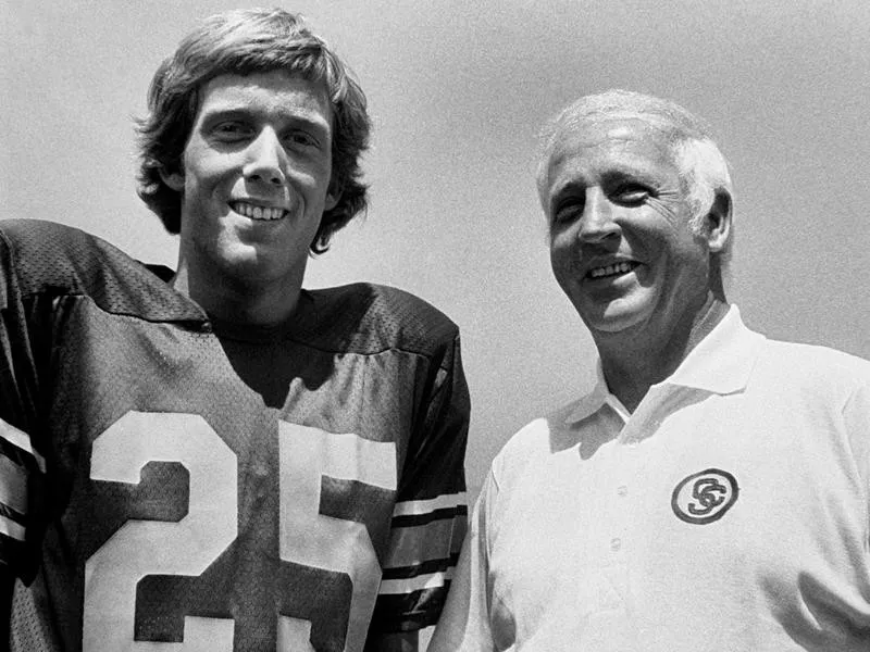 Coach Johnny McKay poses with favorite player, J. K. McKay