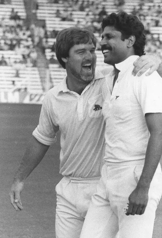 Mike Gatting shares joke with Kapil Dev