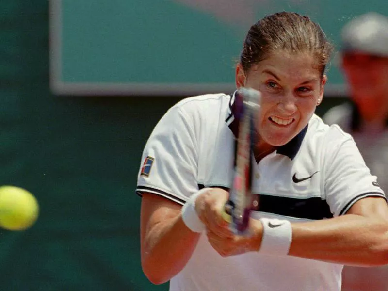 Monica Seles strikes a backhand