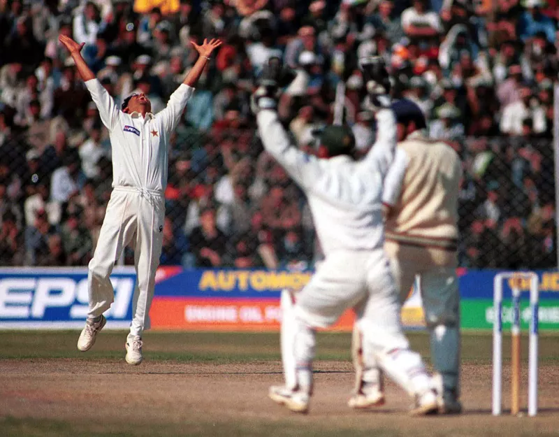 Saqlain Mushtaq celebrates