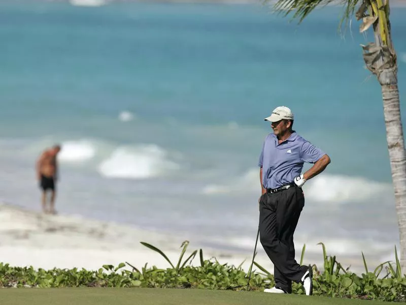 Jose Coceres waits to putt