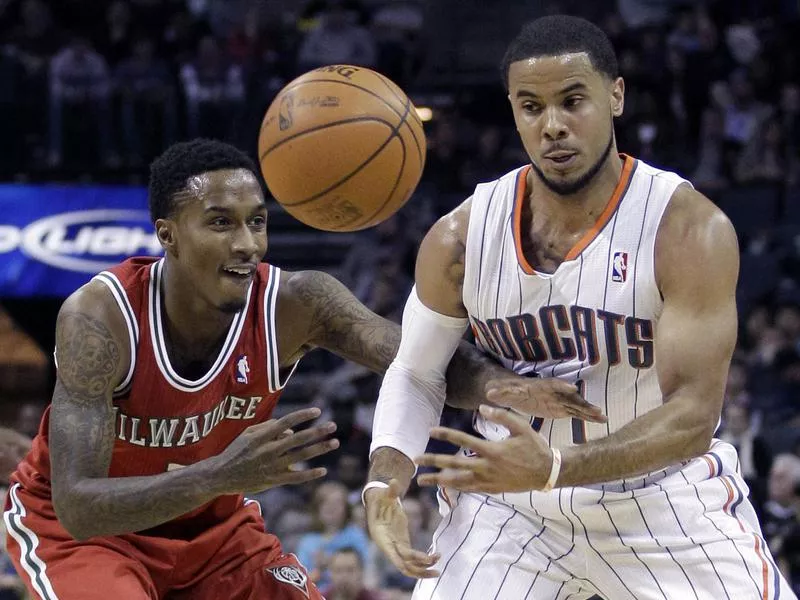 Brandon Jennings and D.J. Augustin