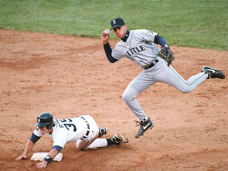 Seattle Mariners shortstop Alex Rodriguez leaps