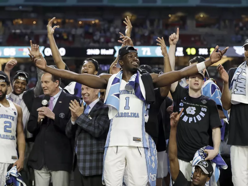 North Carolina's Theo Pinson and teammates celebrate